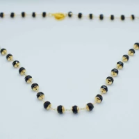 COLLANA PERLE NERE CON COPRIPERLE