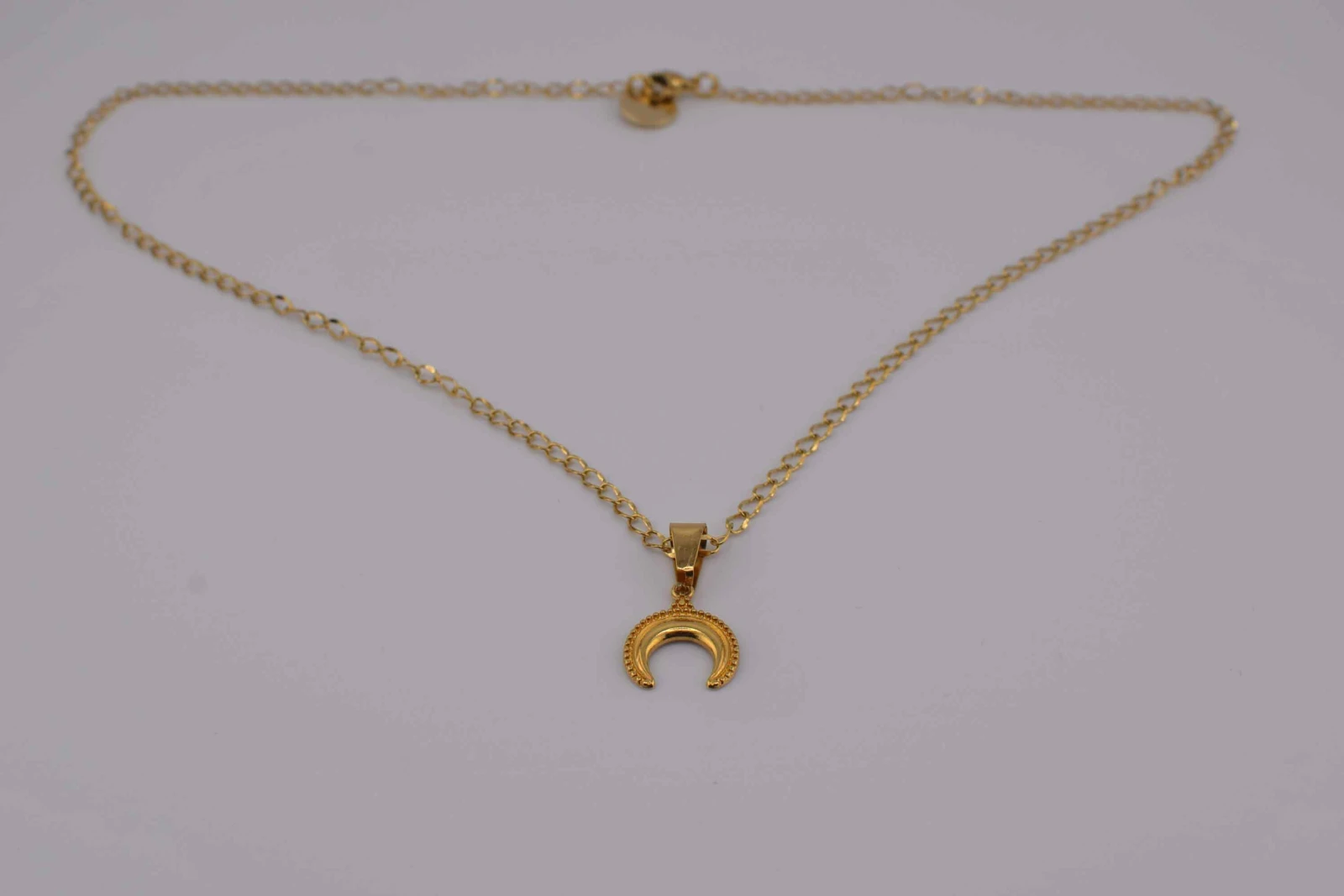 COLLANA CORNO MEZZO CERCHIO ORO