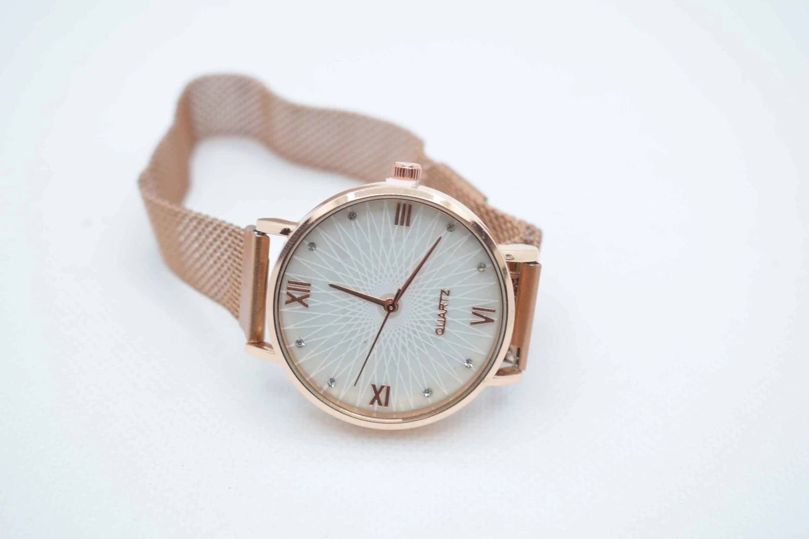OROLOGIO CINGHIA IN ACCIAIO ROSA CALAMITA E QUADRANTE BIANCO RAGGI