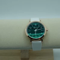 OROLOGIO BIANCO CON QUADRANTE VERDE