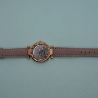 OROLOGIO CON CINGHIA ROSA E QUADRANTE ROSA BRILLANTINATO