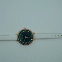 OROLOGIO CON CINGHIA BIANCA E QUADRANTE VERDE SCURO