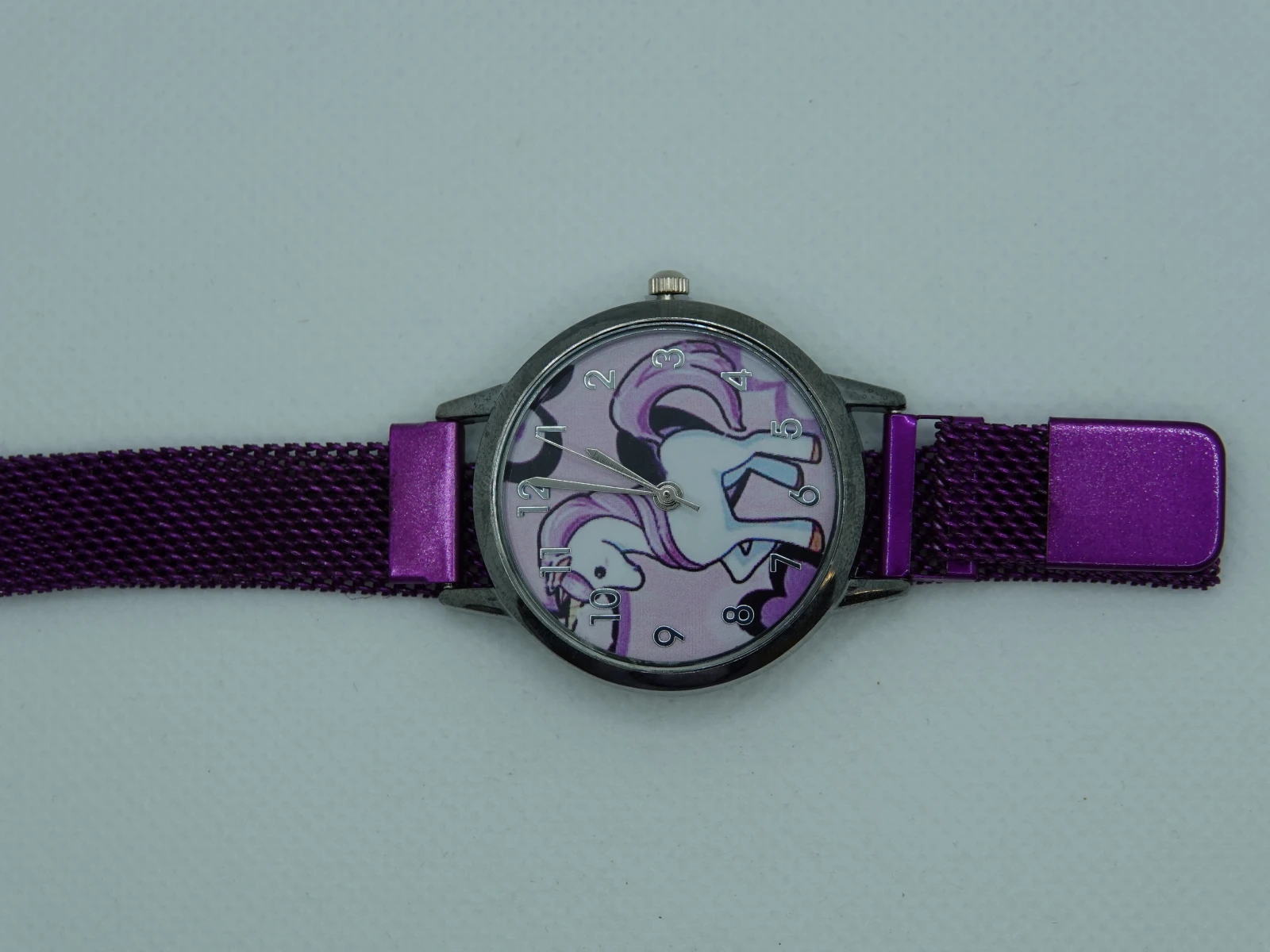 OROLOGIO CON CINGHIA VIOLA CON CALAMITA E QUADRANTE UNICORNO