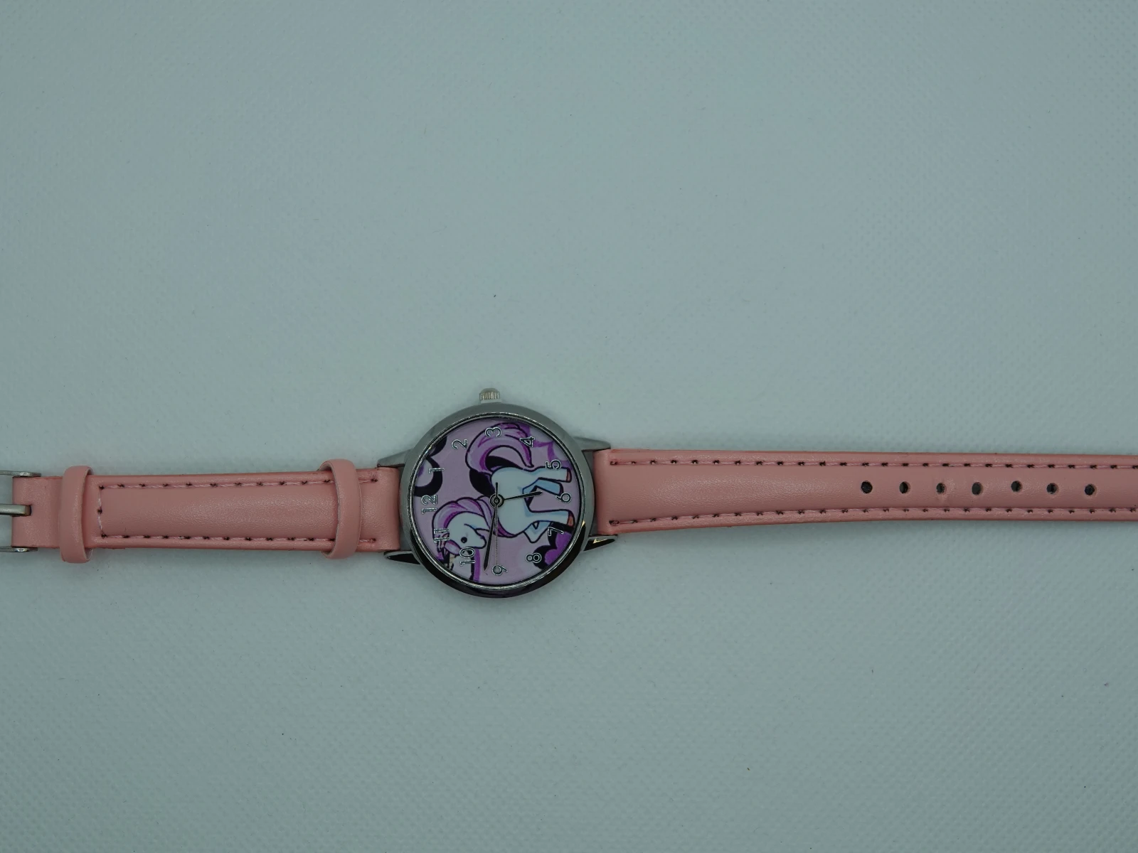 OROLOGIO CON CINGHIA ROSA E QUADRANTE UNICORNO