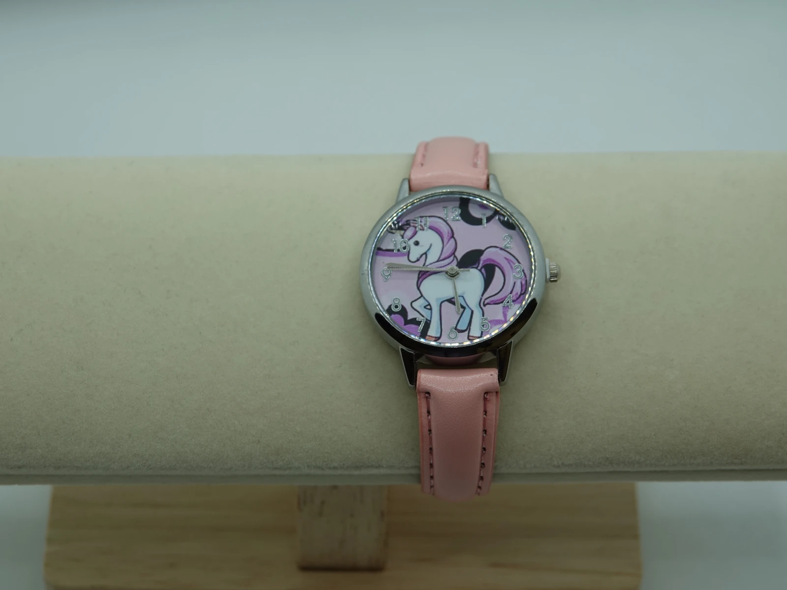 OROLOGIO CON CINGHIA ROSA E QUADRANTE UNICORNO