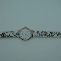 OROLOGIO CON CINGHIA BIANCA CON FIORI E QUADRANTE BIANCO