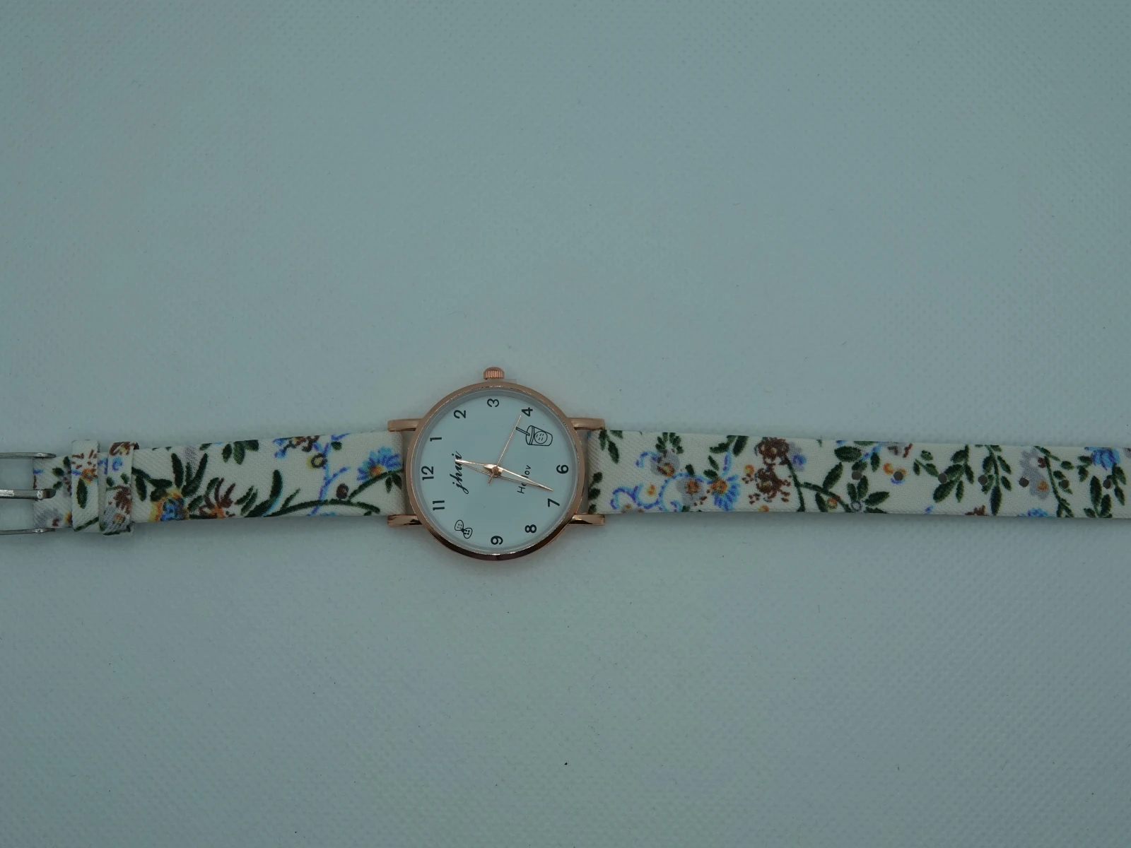 OROLOGIO CON CINGHIA BIANCA CON FIORI E QUADRANTE BIANCO