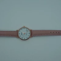 OROLOGIO CON CINGHIA ROSA E QUADRANTE BIANCO