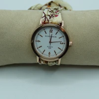 OROLOGIO CON CINGHIA IN TESSUTO PANNA CON FIORI E QUADRANTE BIANCO