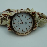 OROLOGIO CON CINGHIA IN TESSUTO PANNA CON FIORI E QUADRANTE BIANCO