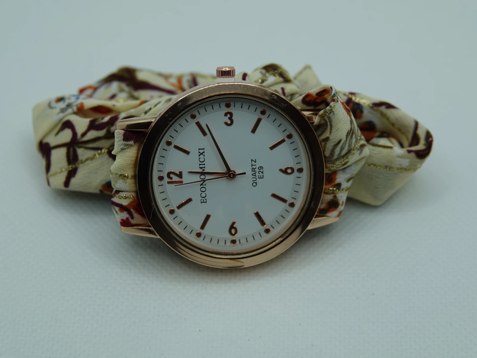 OROLOGIO CON CINGHIA IN TESSUTO PANNA CON FIORI E QUADRANTE BIANCO