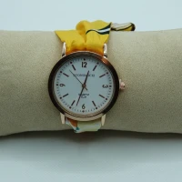 OROLOGIO CON CINGHIA IN TESSUTO PANNA E GIALLO E QUADRANTE BIANCO