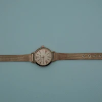 OROLOGIO CON CINGHIA IN ACCIAIO ROSA E QUADRANTE ROSA