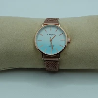 OROLOGIO CON CINGHIA IN ACCIAIO ROSA CON CALAMITA E QUADRANTE AZZURRO