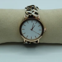 OROLOGIO CON CINGHIA IN TESSUTO LEOPARDATO E QUADRANTE BIANCO