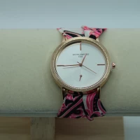 OROLOGIO CON CINGHIA IN TESSUTO ROSA E NERO E QUADRANTE BIANCO