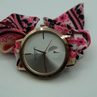 OROLOGIO CON CINGHIA IN TESSUTO ROSA E NERO E QUADRANTE BIANCO