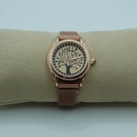 OROLOGIO CON CINGHIA IN ACCIAIO ROSA E QUADRANTE CON ALBERO DELLA VITA
