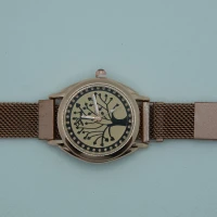 OROLOGIO CON CINGHIA IN ACCIAIO ROSA E QUADRANTE CON ALBERO DELLA VITA